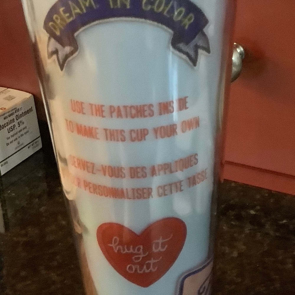 Starbucks cup with patches. 24 oz